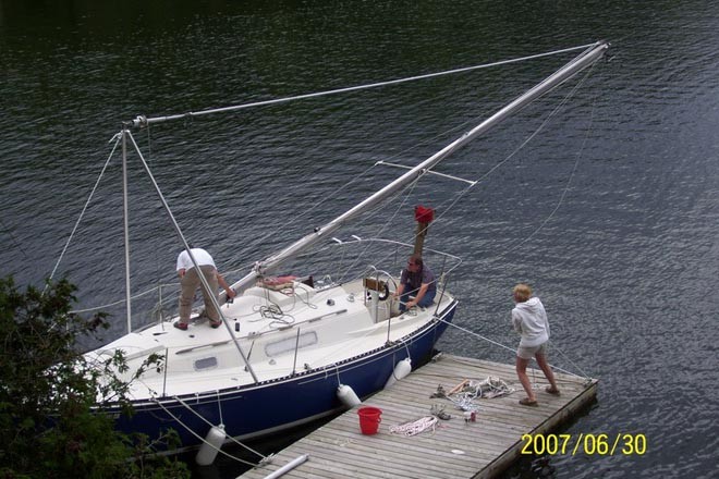 Checking the rigging - Taking the mast out of some boats is easier than others ©  SW